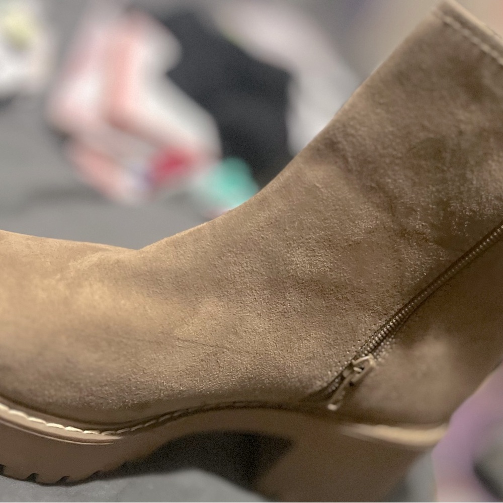 Above the ankle taupe booties. Never worn.